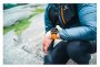 Часы Suunto Spartan Sport Wrist HR с оранжевым ремешком на руке спортсмена в горах №7